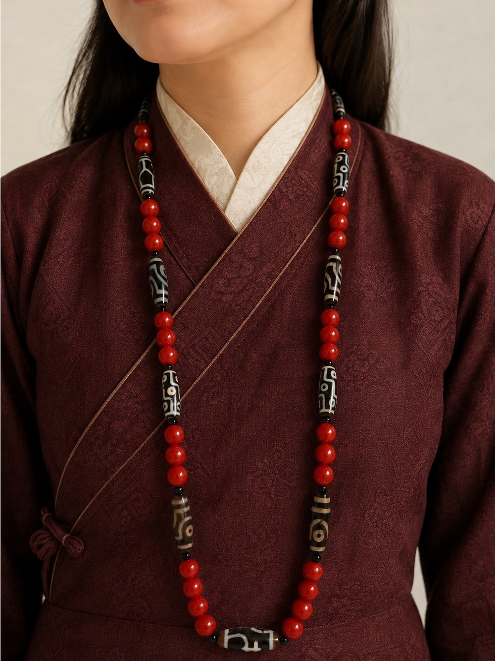 Tibetan Dzi bead necklace with red coral beads